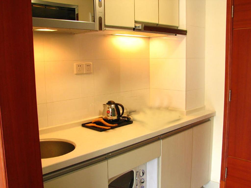 Estay Apartments Kuangcsou Szoba fotó